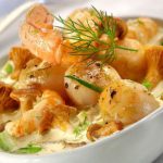 Cassolette de noix de saint jacques et de langoustines au citron