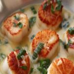 Pétoncles poêlés au vin blanc sauce au beurre