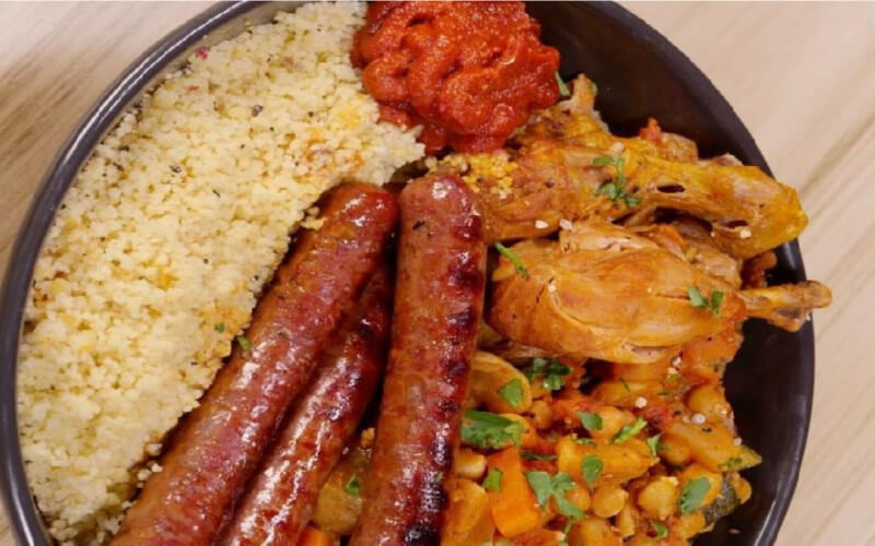 Couscous au poulet, merguez et légumes