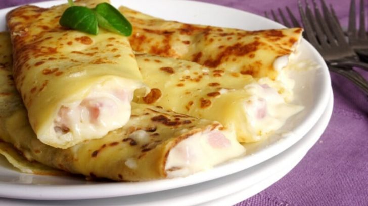 Crêpes au jambon, fromage, et champignons à la béchamel – Toutes Recettes