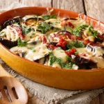 Gratin d’aubergines et tomates au fromage